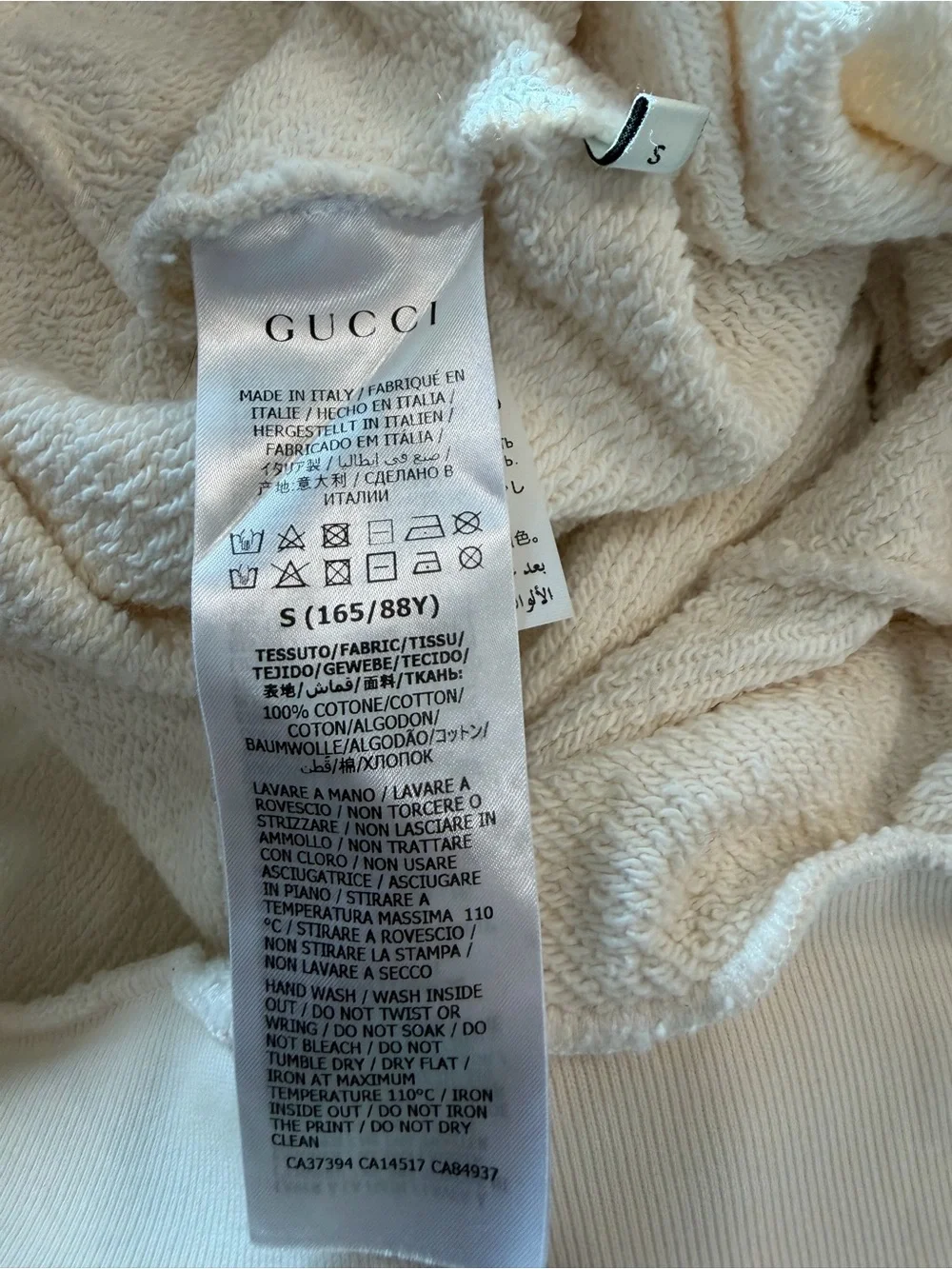 Gucci Cream Sweater with Black Trim and Red Stitching